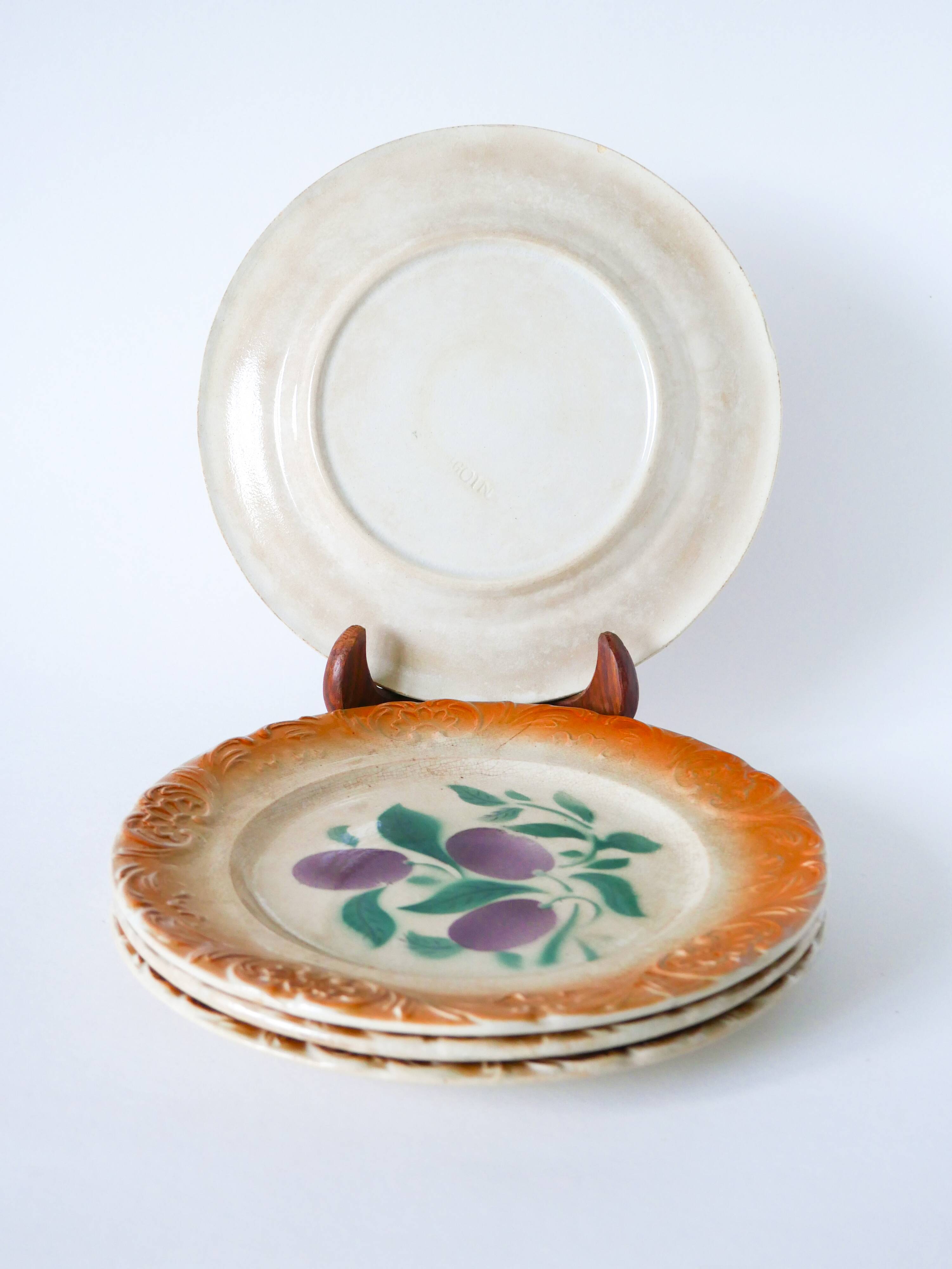 Set of 4 Sarreguemines earthenware plates, early 20th century