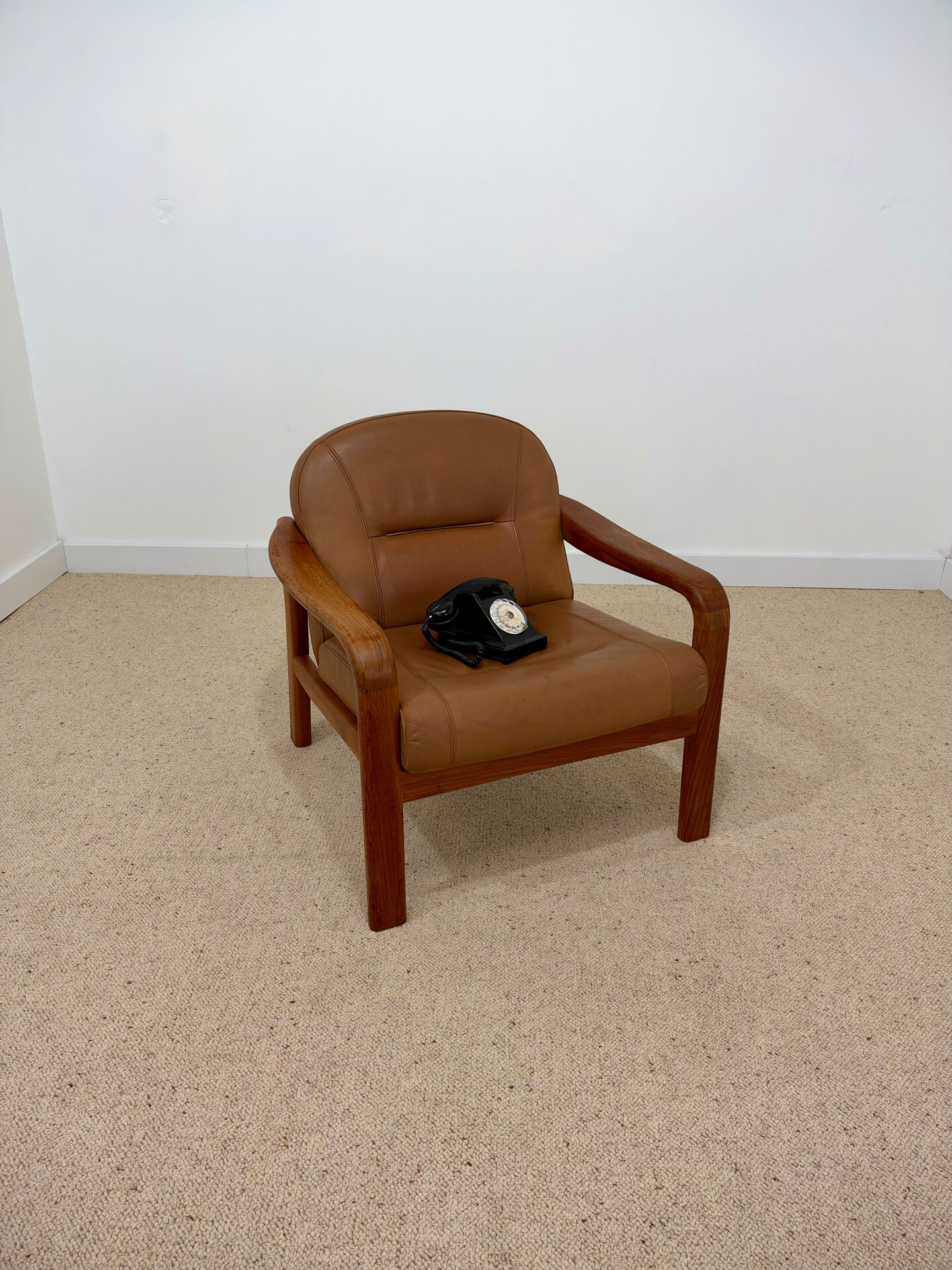 Vintage leather and wood armchair – 1970s