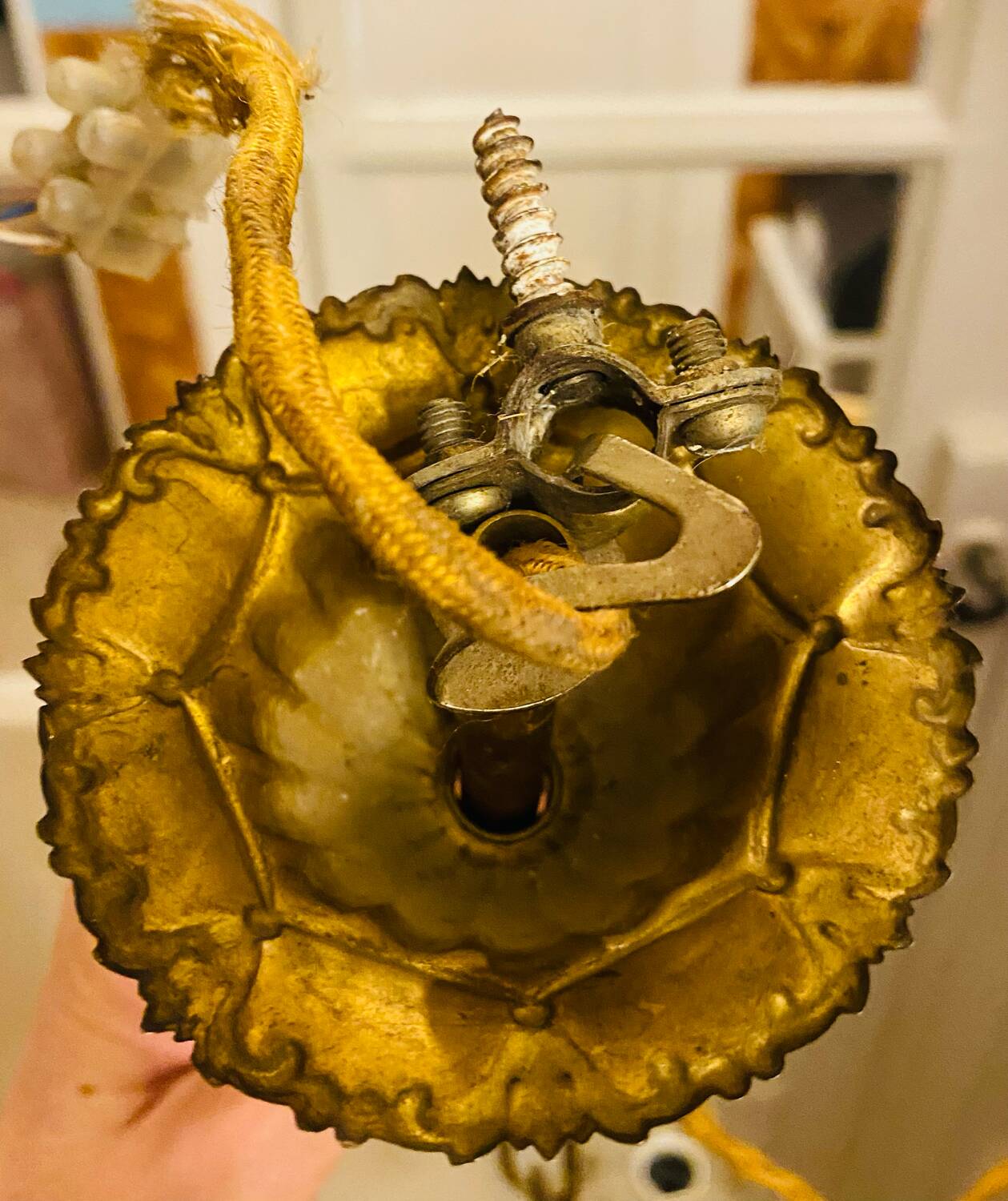 Golden brass chandelier and glass