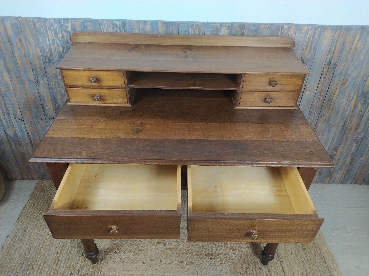 Wooden desk with turned feet