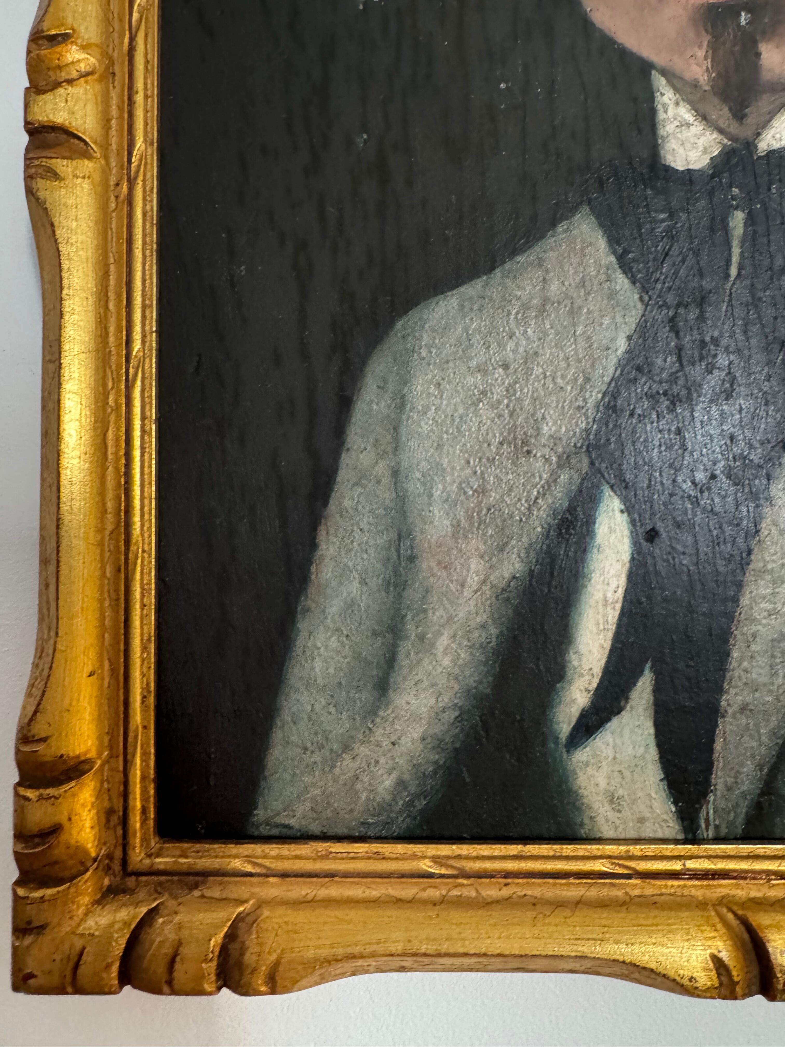 Portrait of a dandy with a moustache from the early 20th century.
