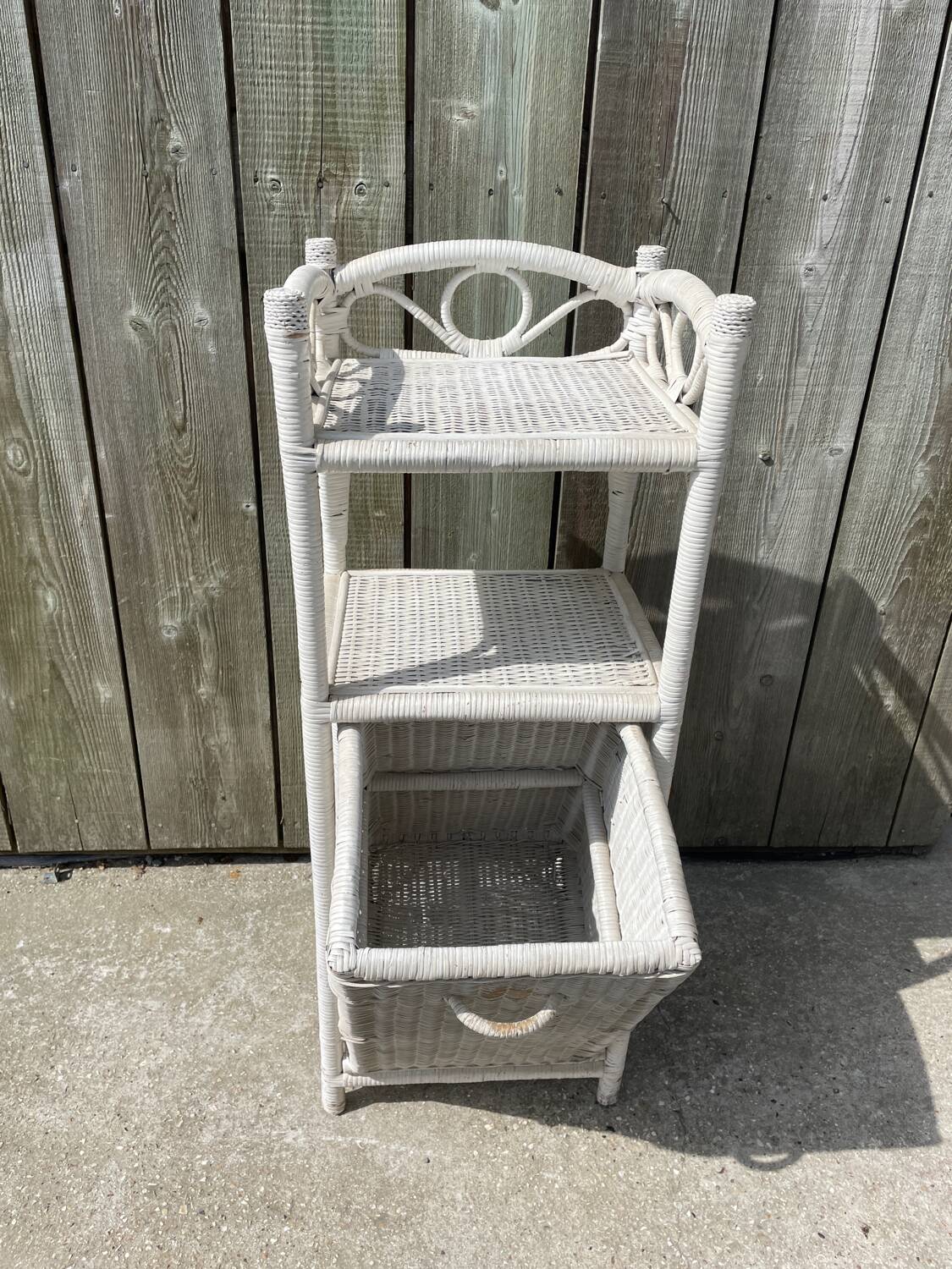 Small white wicker bathroom shelf