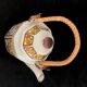 Teapot floral decoration on Japanese cloisonné background