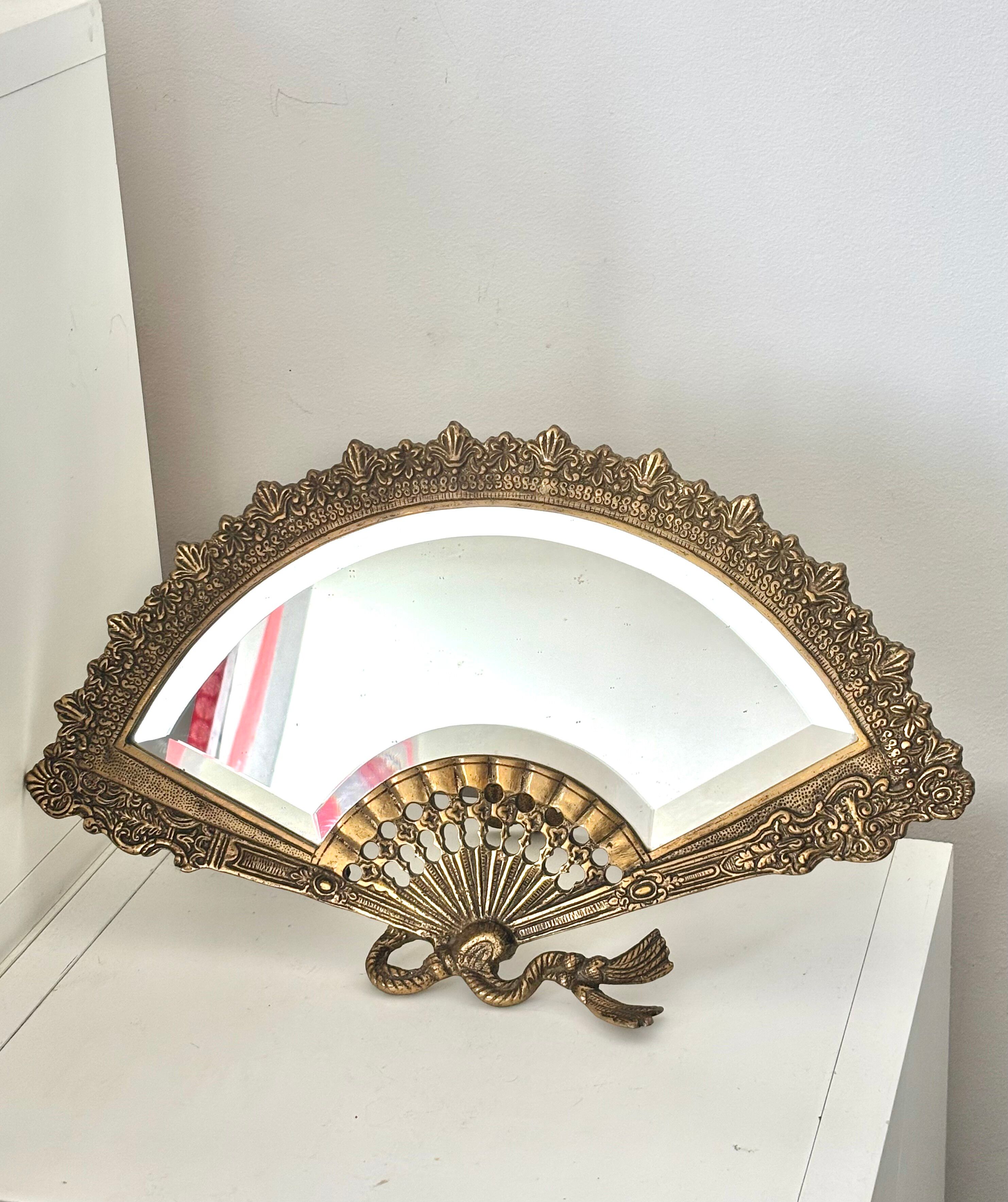 Antique brass mirror