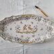 Large oval earthenware dish from Martres Tolosane, “Moustiers” model