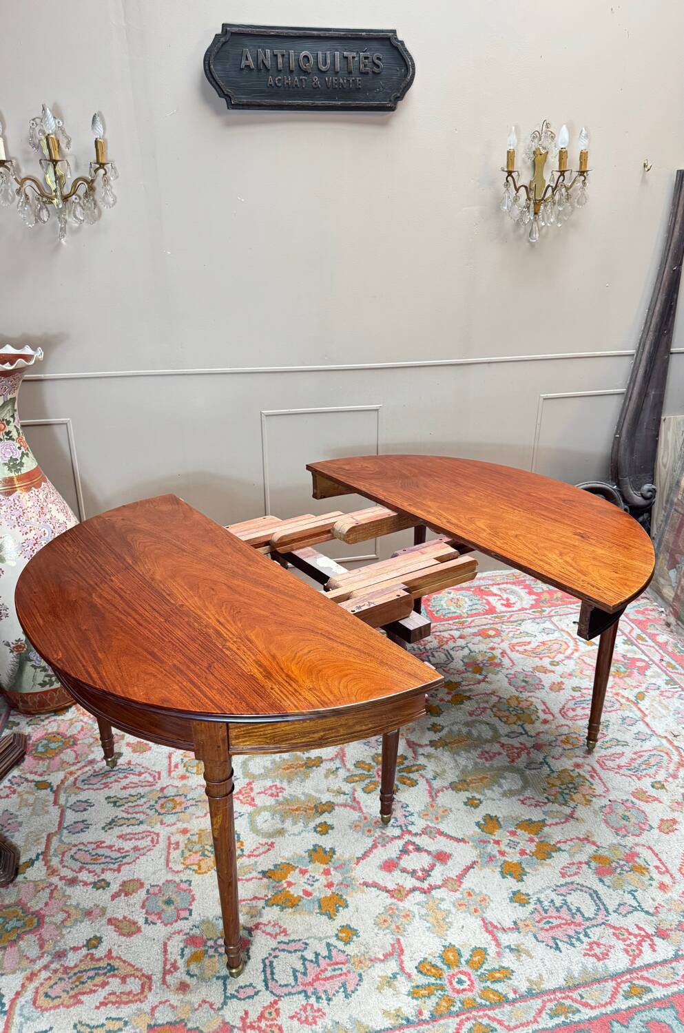 Dining table with a mahogany band in louis xvi style