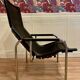 Reclining armchair in black leather and chrome design "hans eichenberger" 1960.