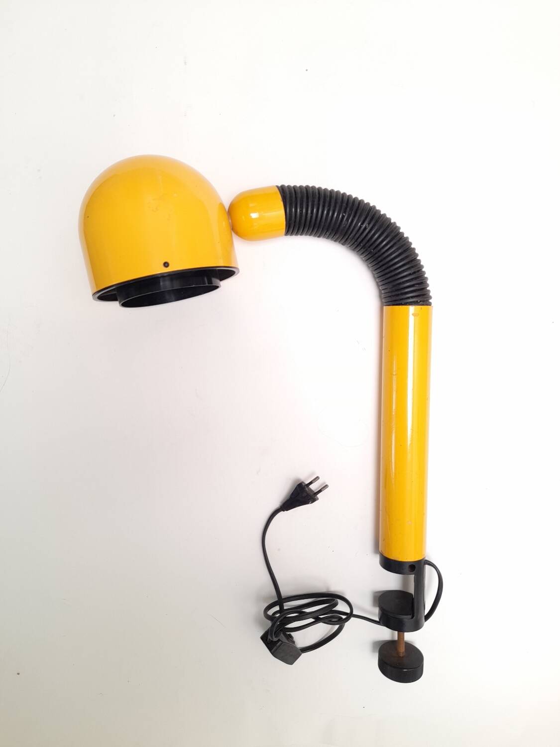 Bright yellow tubular desk lamp from the 80s