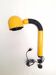 Bright yellow tubular desk lamp from the 80s.