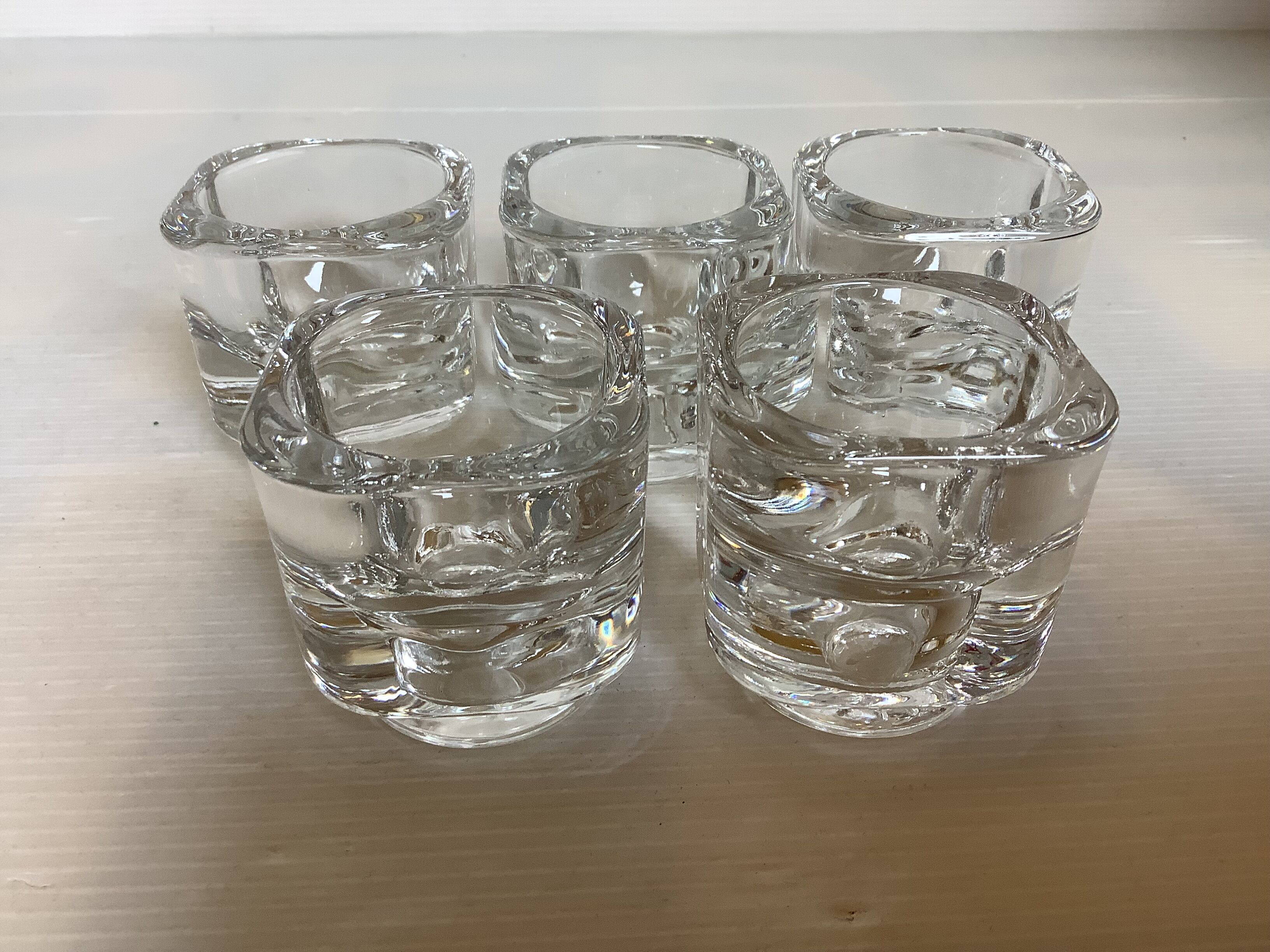 Five candle holders or egg cups designed by Joe Colombo.