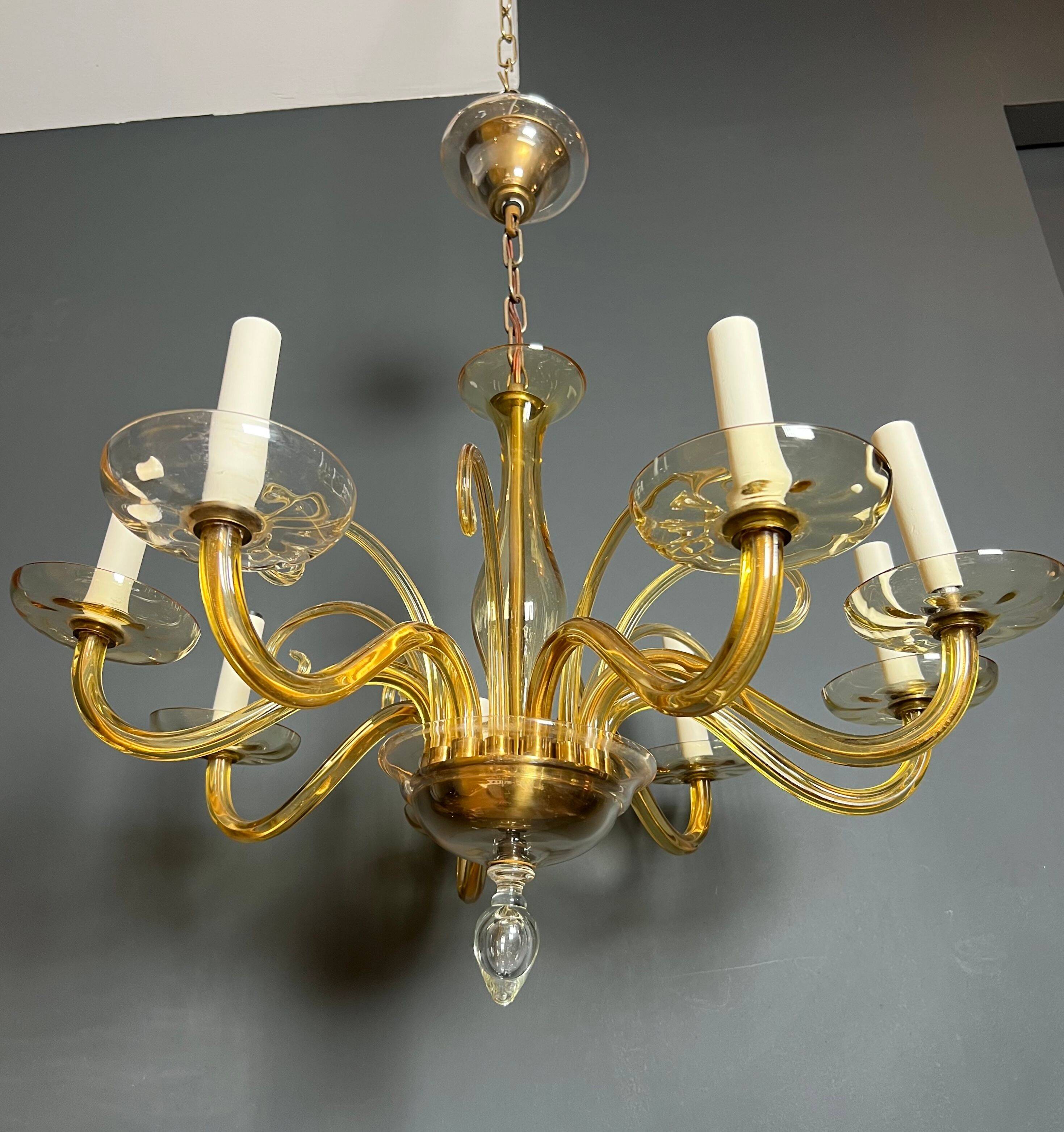 Orange Murano crystal chandelier with 8 light arms. Italian work. Circa 1970.