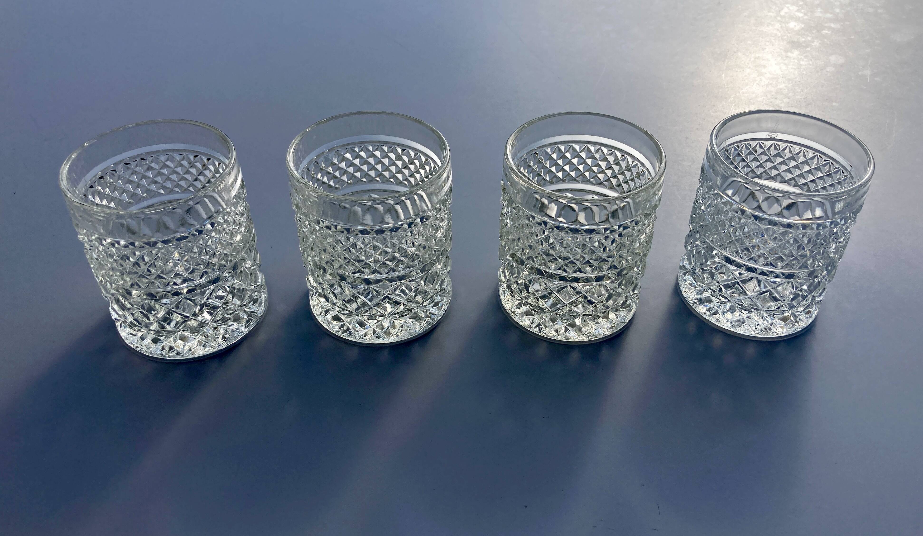Set of 4 vintage glasses from the 60s-70s in moulded glass.