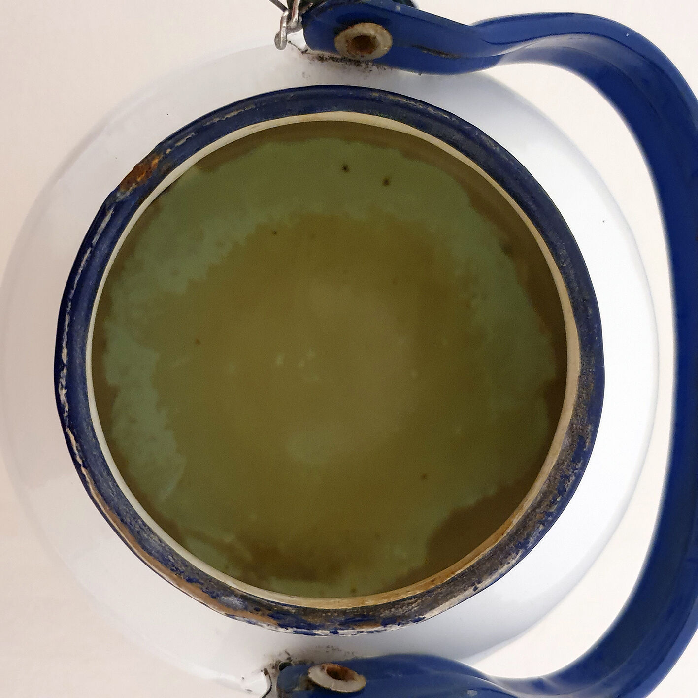 White and blue enamelled kettle