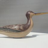 Carved painted wooden curlew