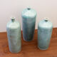 Trio de vases soliflores bouteilles en céramique emaillé