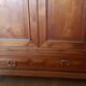 Antique solid wood wardrobe with cornice.