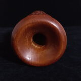 Exotic vase in carved wood