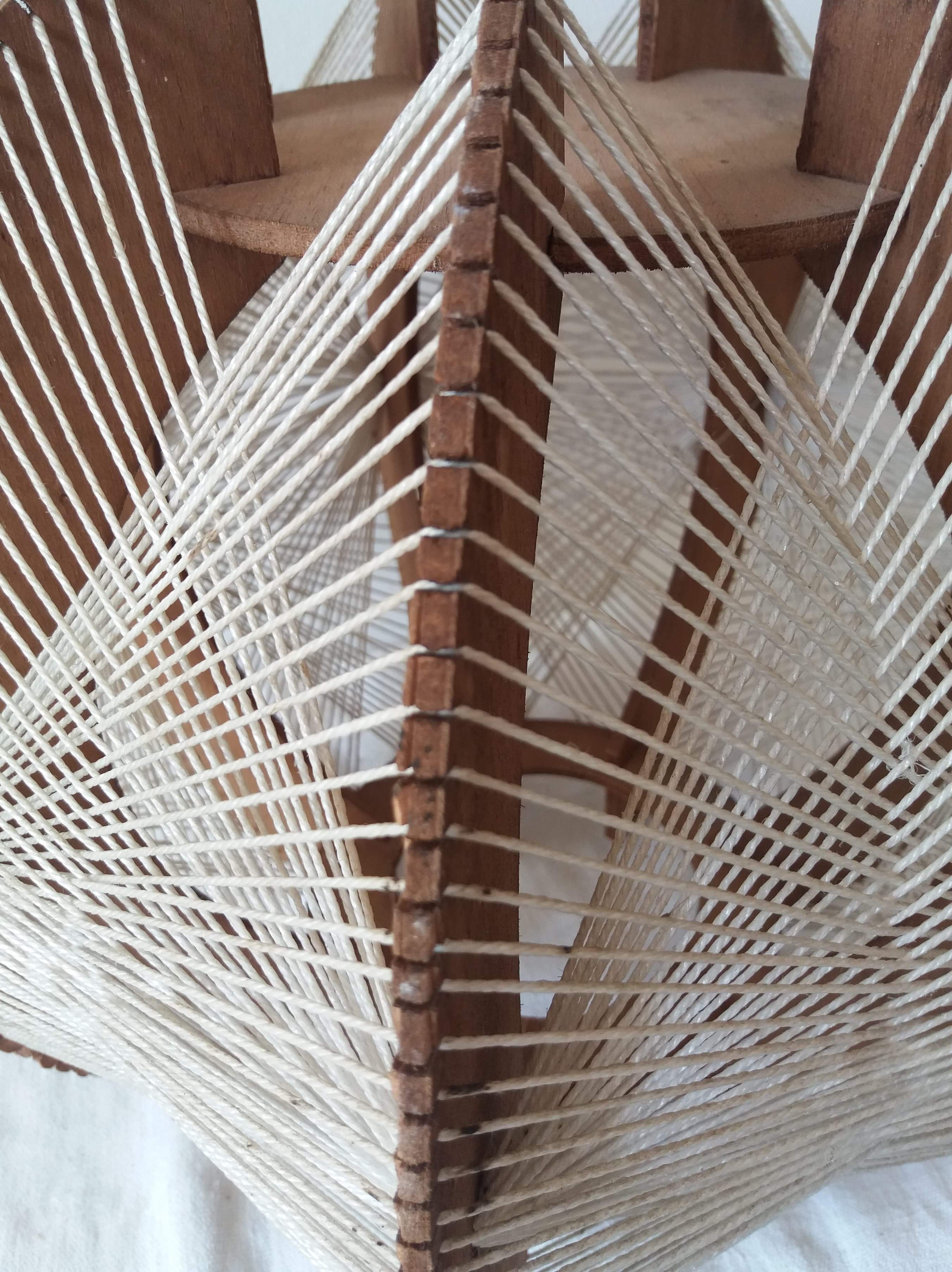 Scandinavian hanging lamp in wood and stretched wires