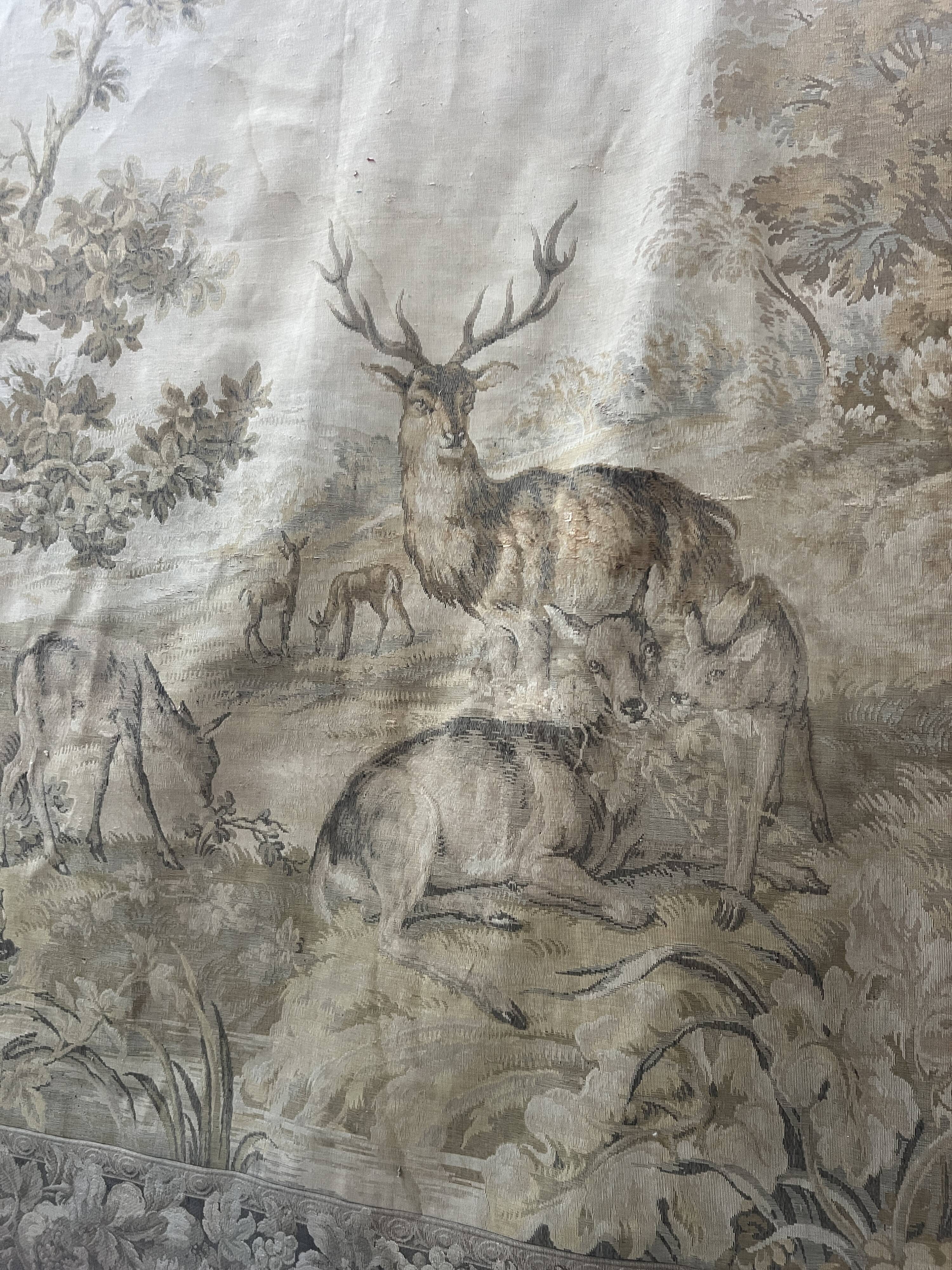 Renaissance-style tapestry with animal motifs, 20th century.