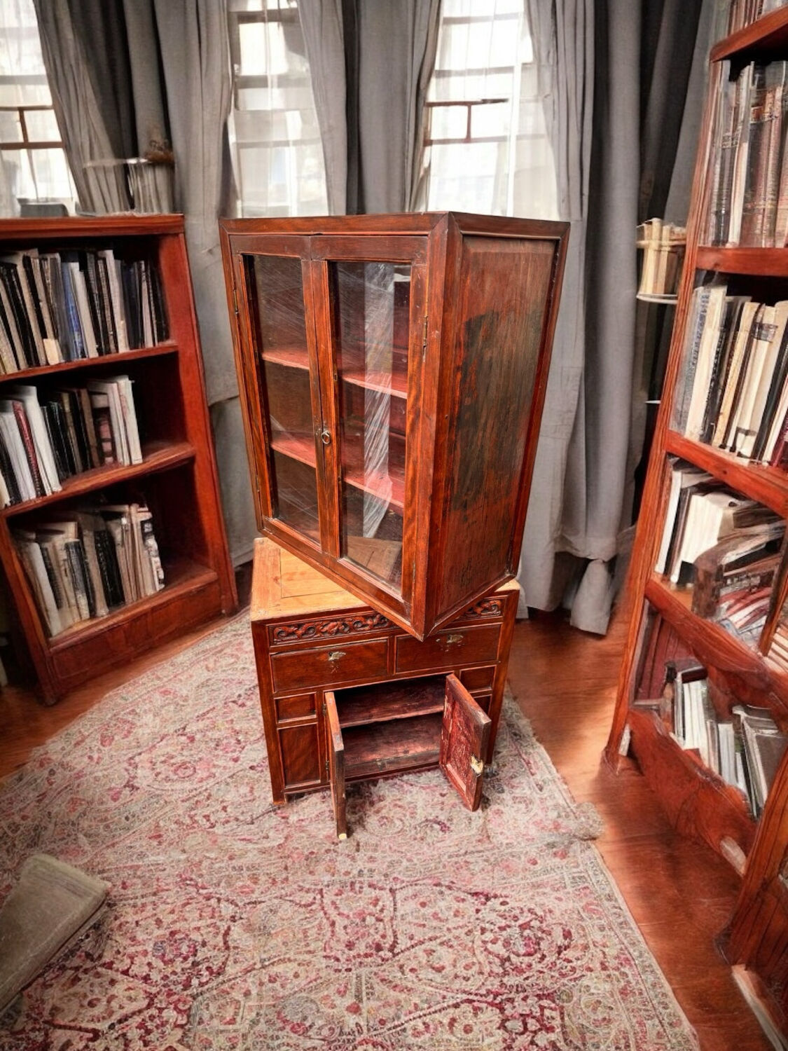 Attractive two-part Indochinese display cabinet. Mid-20th century