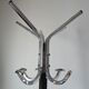 Chrome parrot coat rack with swivel head on a gas lift.
