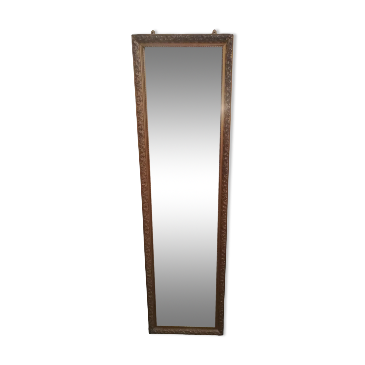 High and narrow mirror in gilded stucco late nineteenth century