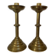 Pair of tulip foot candlesticks in brass