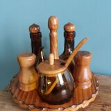 Oil, vinegar, mustard, pepper, salt, olive wood servant from Spain.