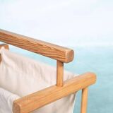 Bohemian magazine rack in vintage 70s pine style.