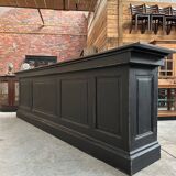 Huge bar counter covered in blue stone