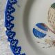 18th century decorative plate in Saint Clement earthenware signed with rooster decoration