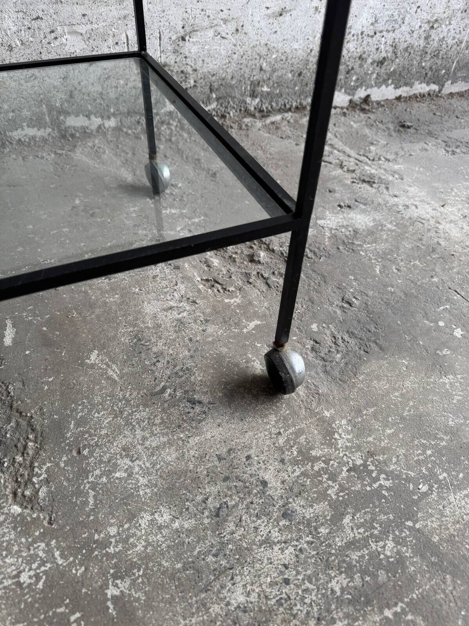 Herbert Hirche black metal side table with chrome tubular frame and laminated top, Bauhaus 1950s