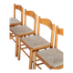 4 solid pine chairs, straw seats, shaped backrest.