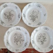 4 assiettes creuses en faïence de Lunéville