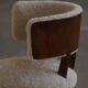 A modern Danish elegant low-back chair, reupholstered in lambswool, 1940s.