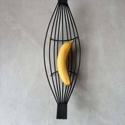 Minimalist black steel wire fruit bowl from the 1950s.