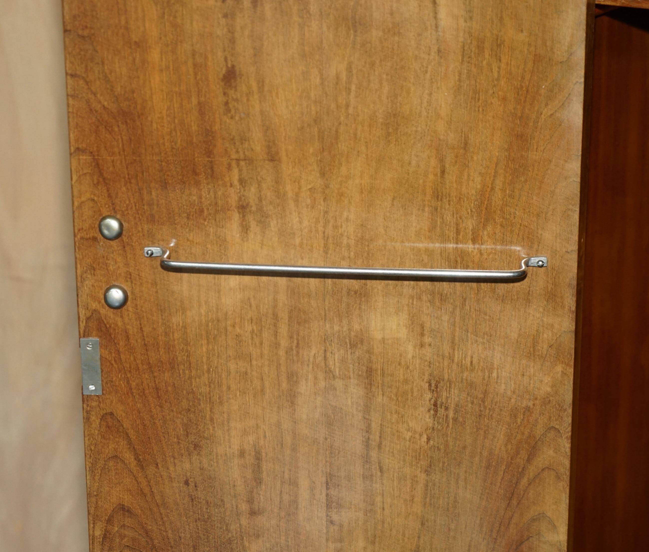 Small Art Deco wardrobe in satin walnut, circa 1930.