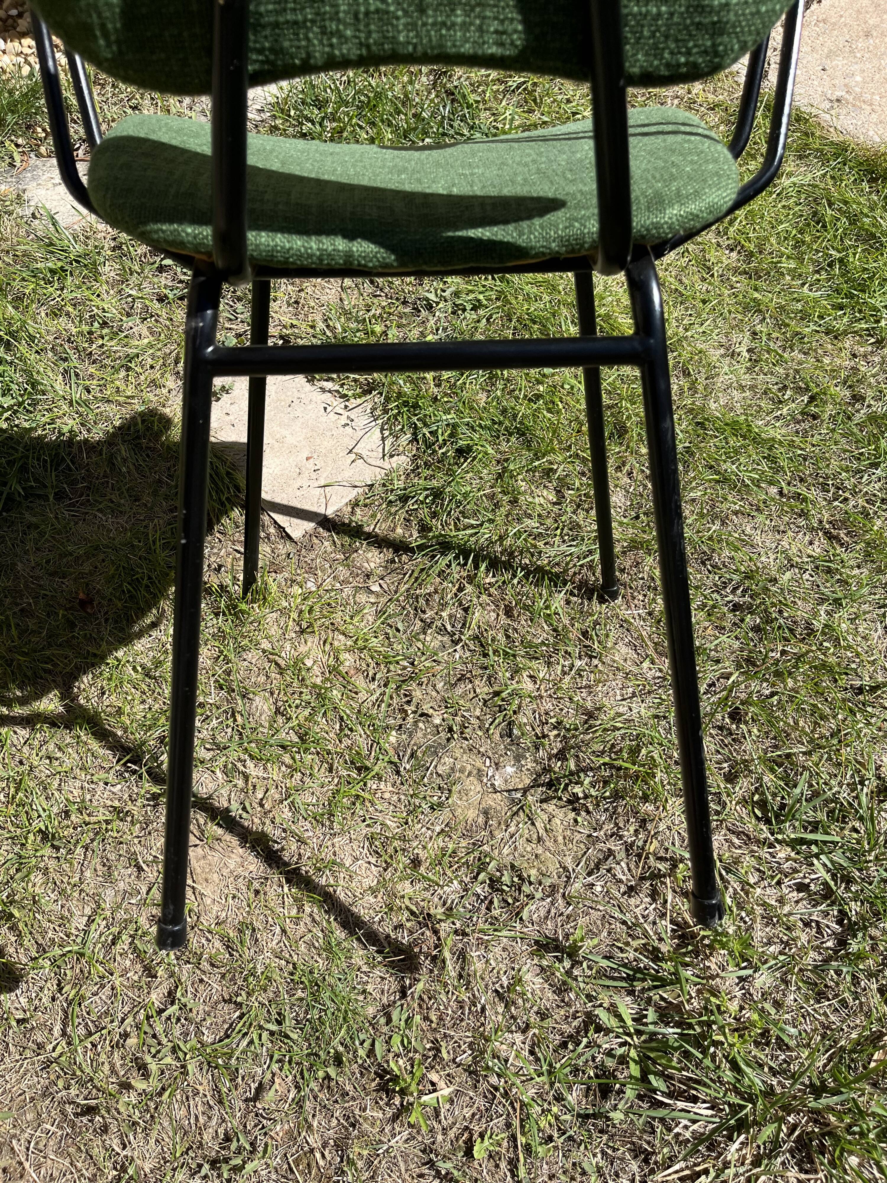 50s chair with armrests.