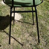 50s chair with armrests.