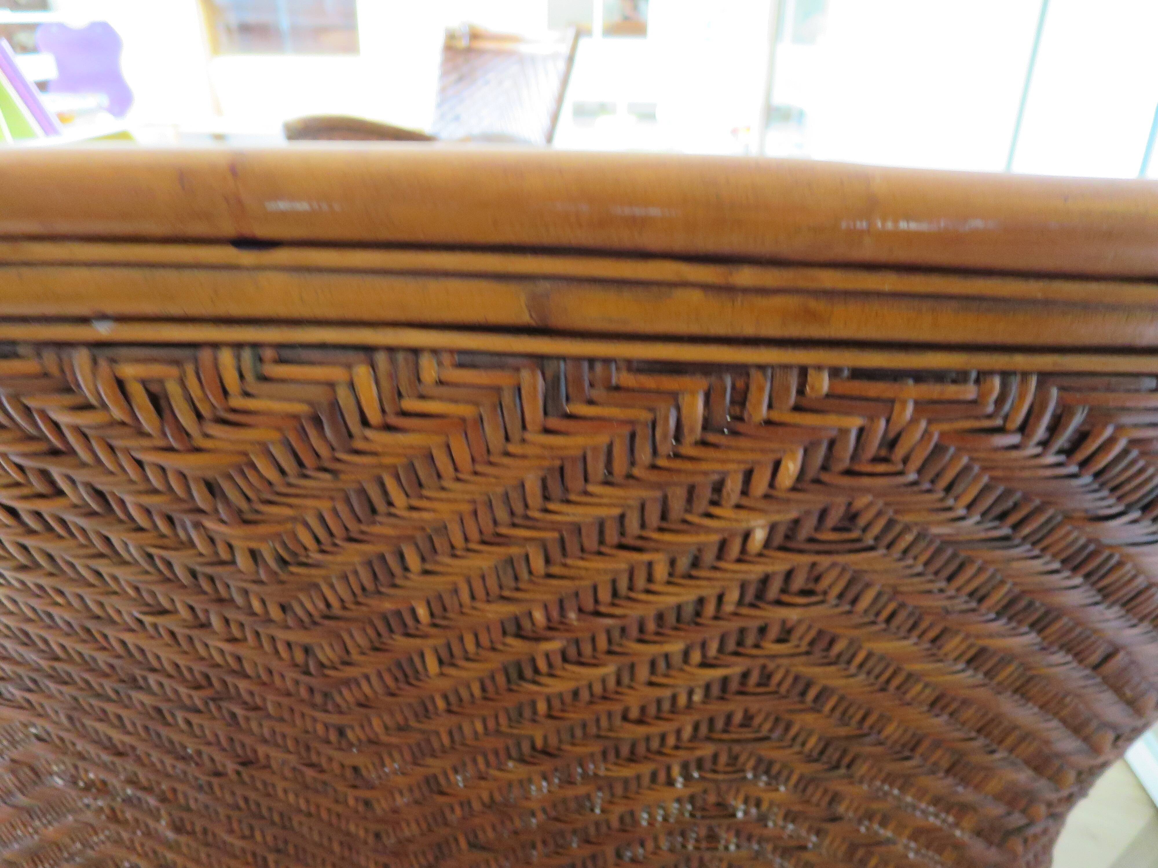 Two-seater banquette in woven rattan, wood and bamboo, 1980s.