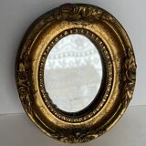 Small old mirror in gilded wood