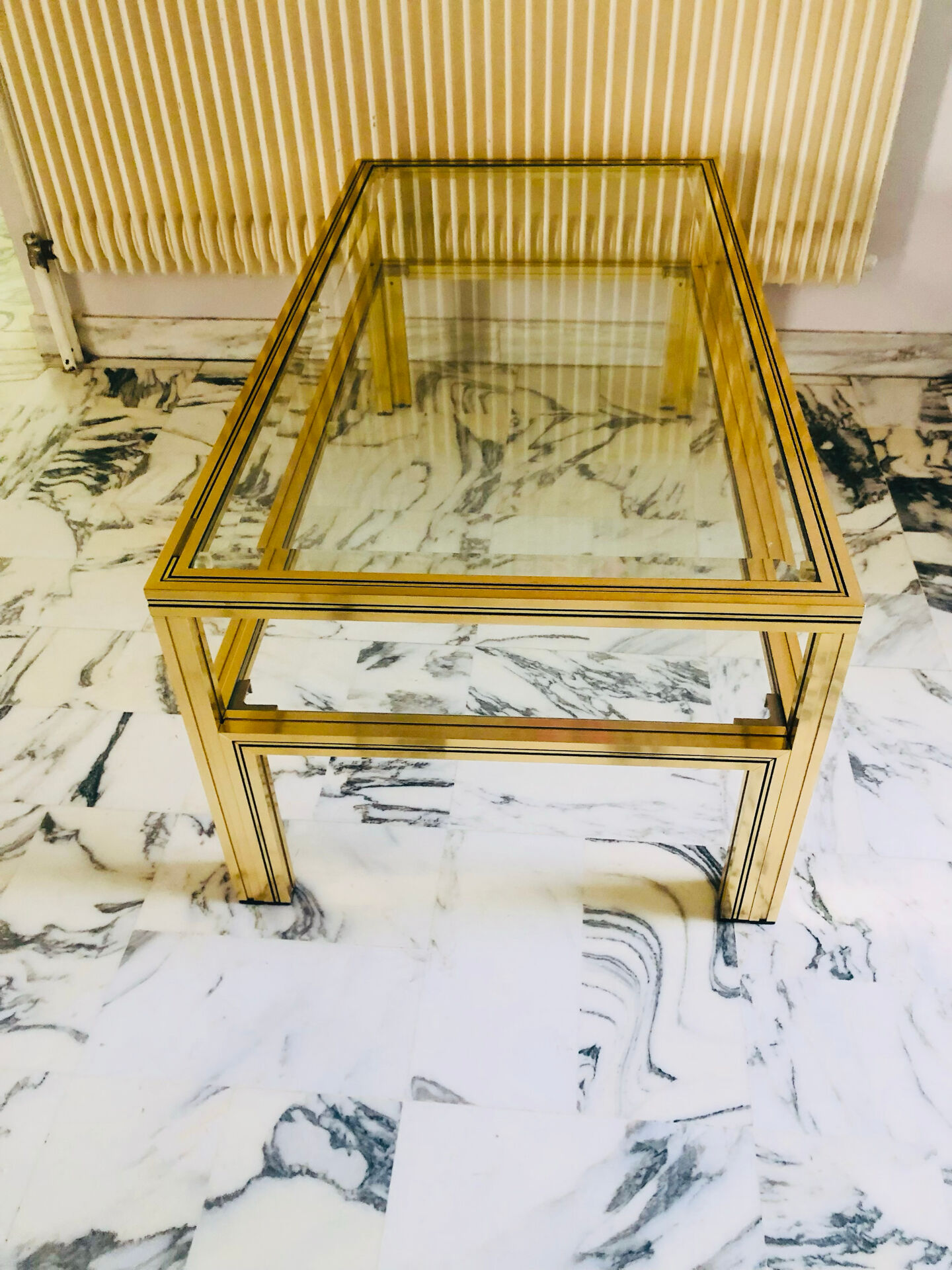 Coffee table with 2 brass and glass tops signed Pierre Vandel Paris, circa 70s.