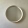 Scandinavian white round mirror from the 60s