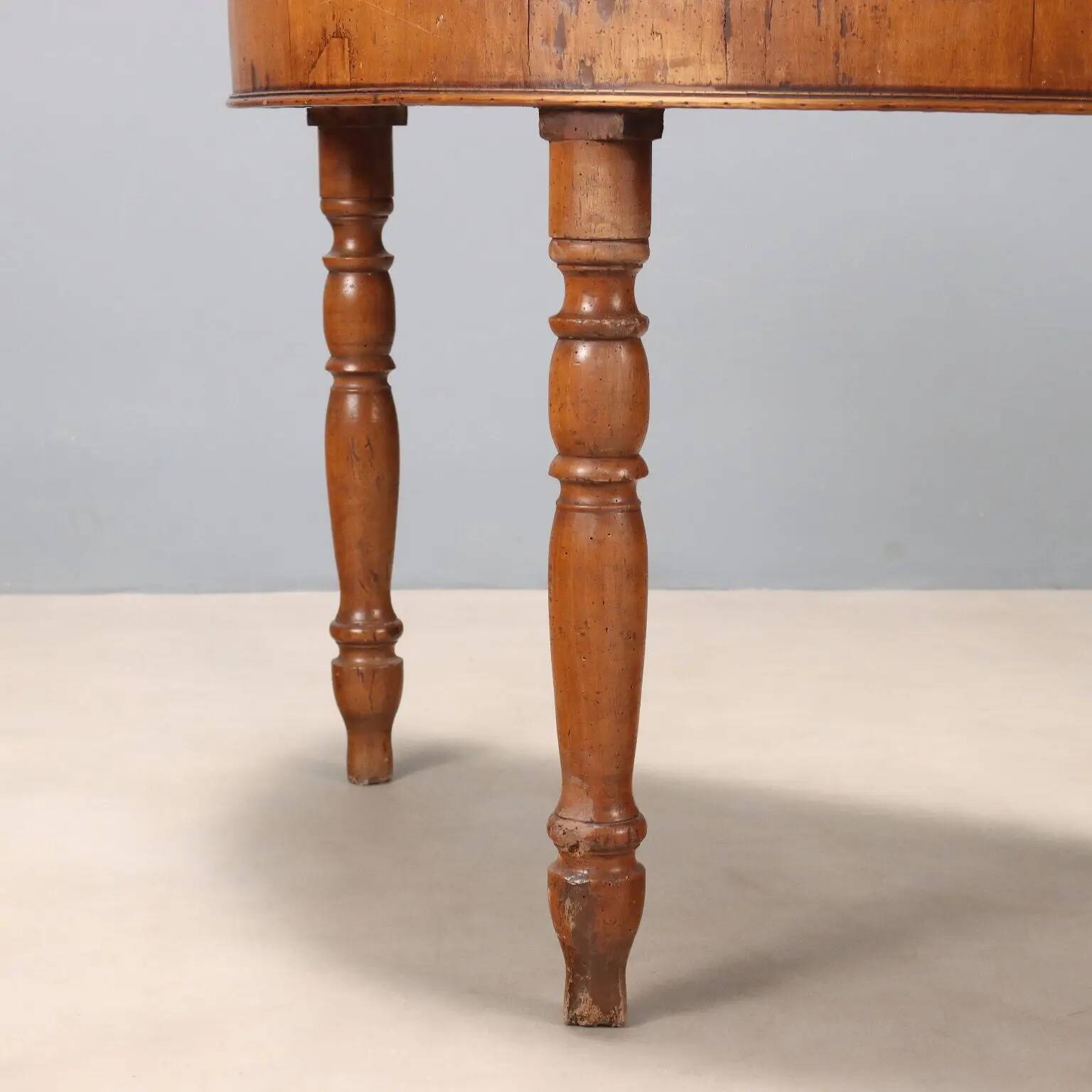 Antique walnut console with a half-moon top, Italy, 19th century.