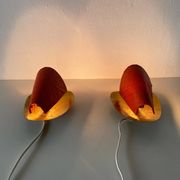 Pair of orange plexiglass and curved brass wall lights, 1950s, Germany