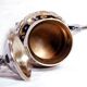 Oriental teapot in chrome metal and brass, 12x19cm