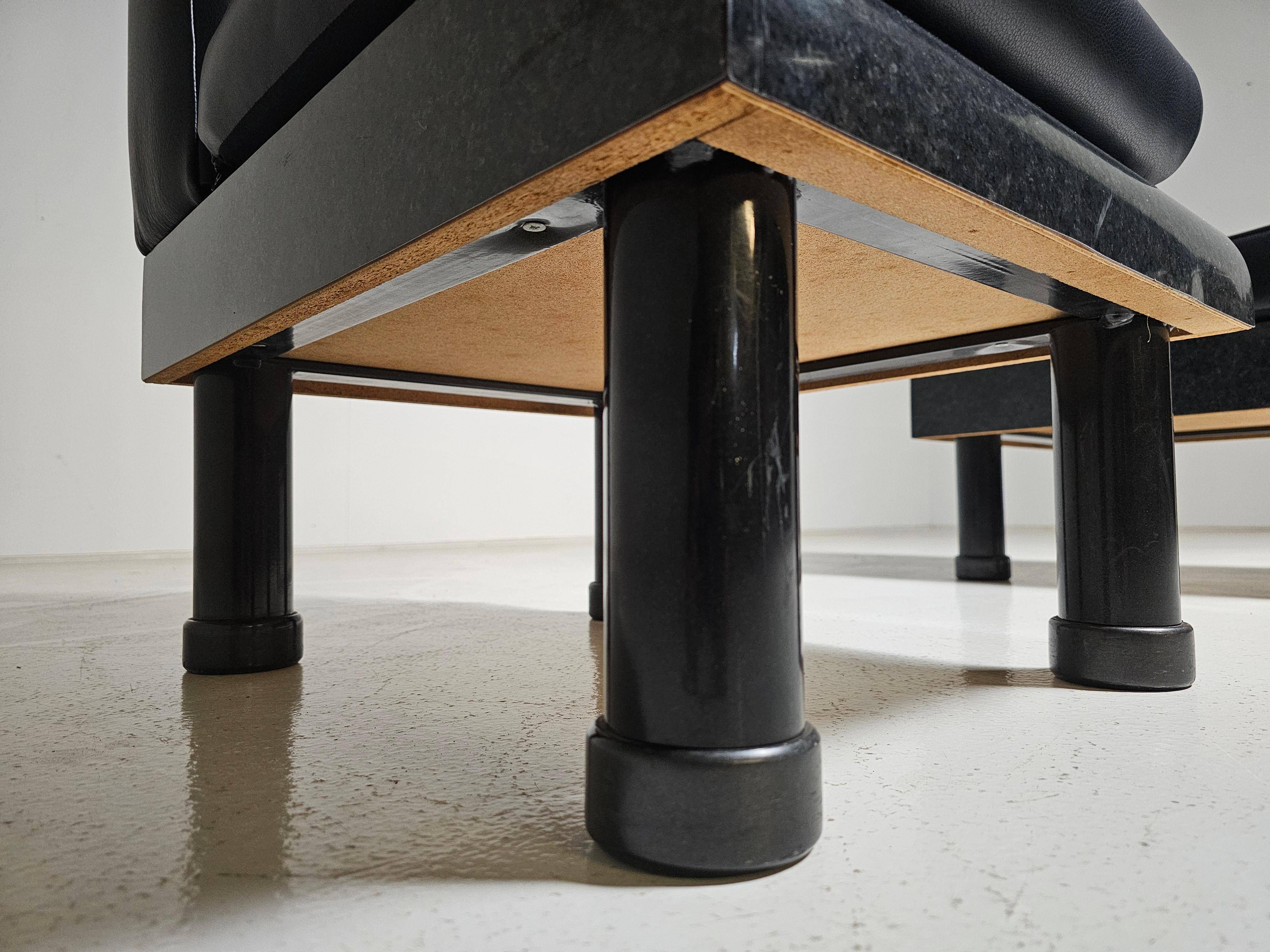 Black leather loungers in the style of The Brisk One by Ettore Sottsass, 1980.