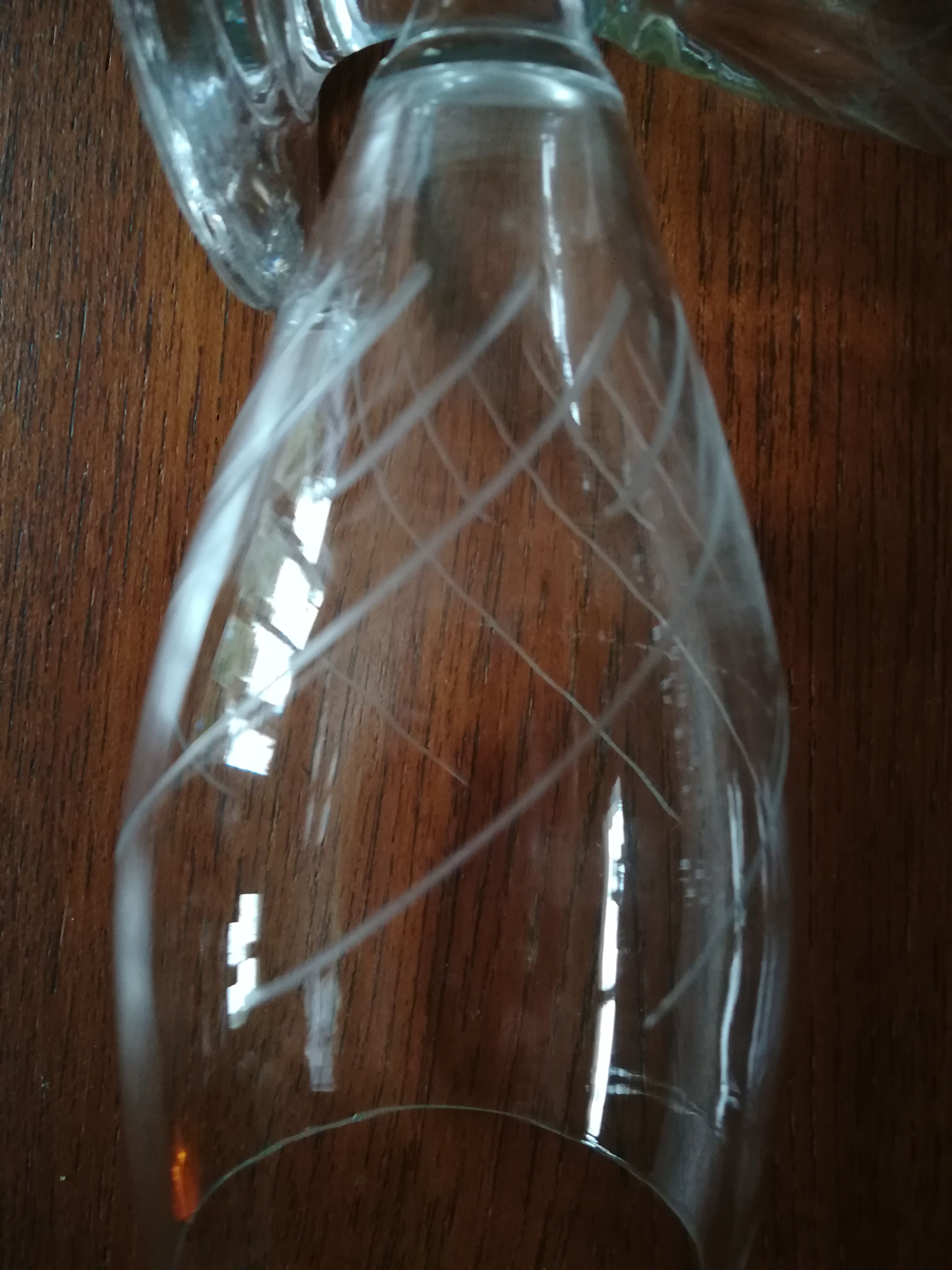 Eight champagne flutes in engraved glass