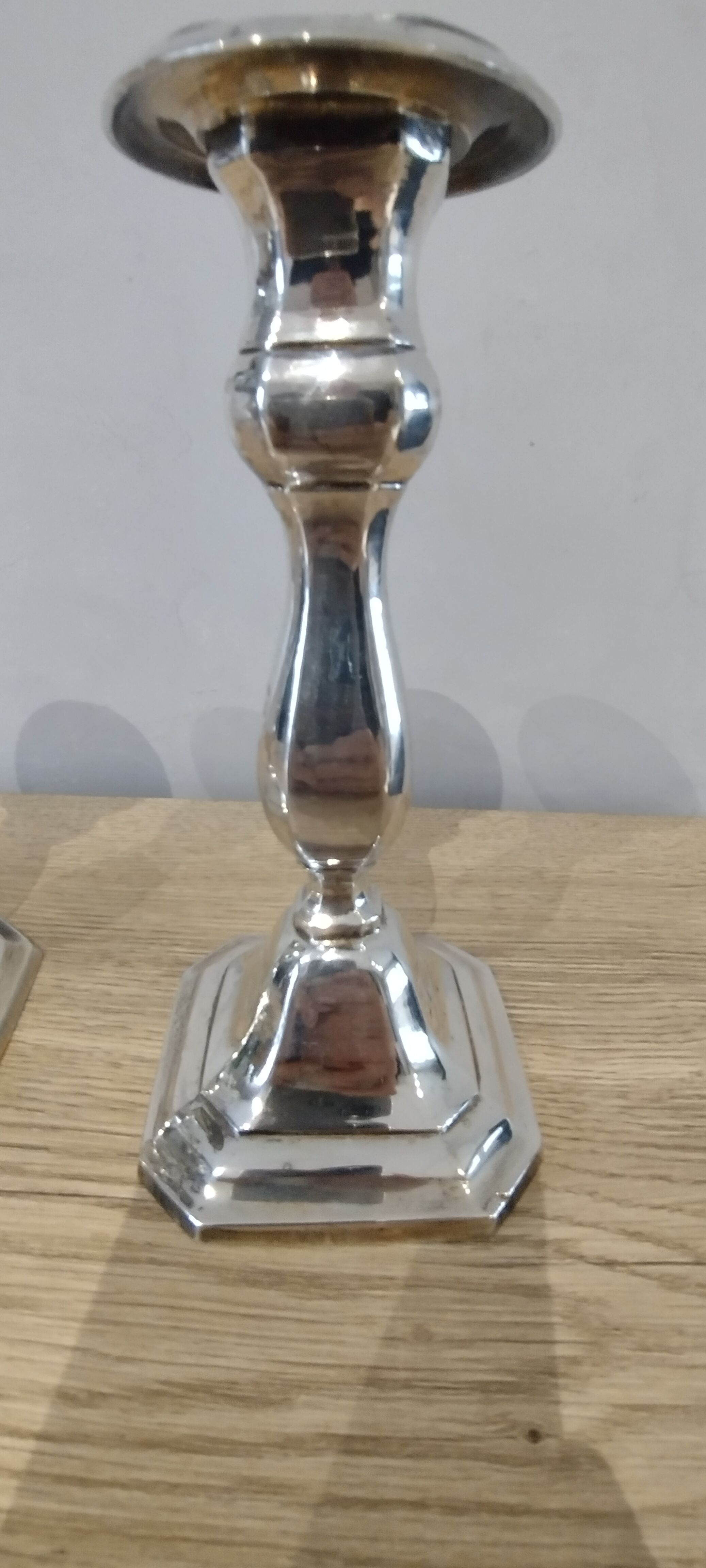 Pair of silver metal candle holders