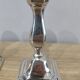 Pair of silver metal candle holders